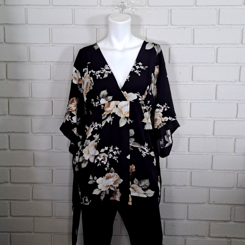 Black Floral Unique Sleeve Deep V-Neck Blouse. Size 8 NWOT